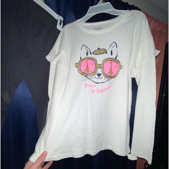 Two new long sleeved shirts with a pair of matching pants. - Picture 2 of 4